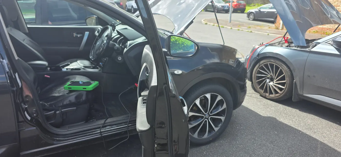 Lost My Key NI roadside auto locksmith working on a vehicle in Fermanagh