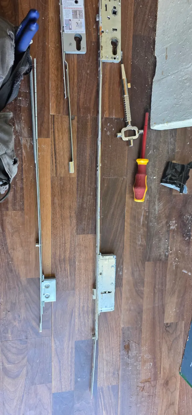 uPVC multi-point locking mechanism being repaired on site